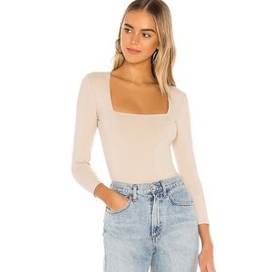 Beige free people body suit.